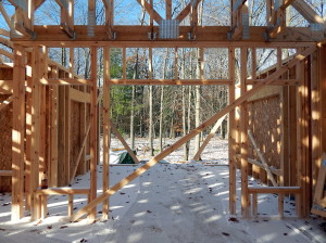 View from the Family Room, through the Sun Room, of the woods.