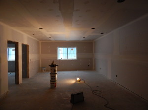 Lower Level drywall hung and being prepped for primer.