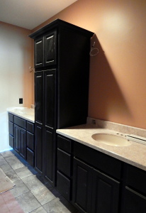 Master Bath cabinets and tops installed. Mirrors and light fixtures to come this week.